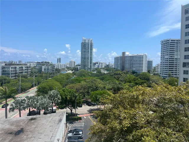 a view of a city with tall buildings