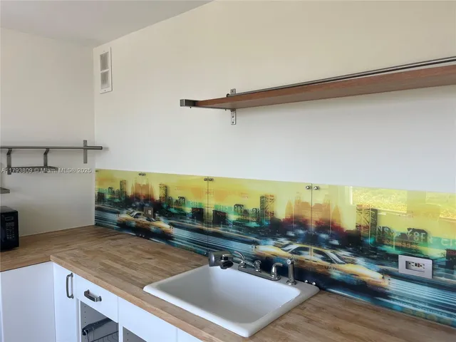 a view of a living room and dining room