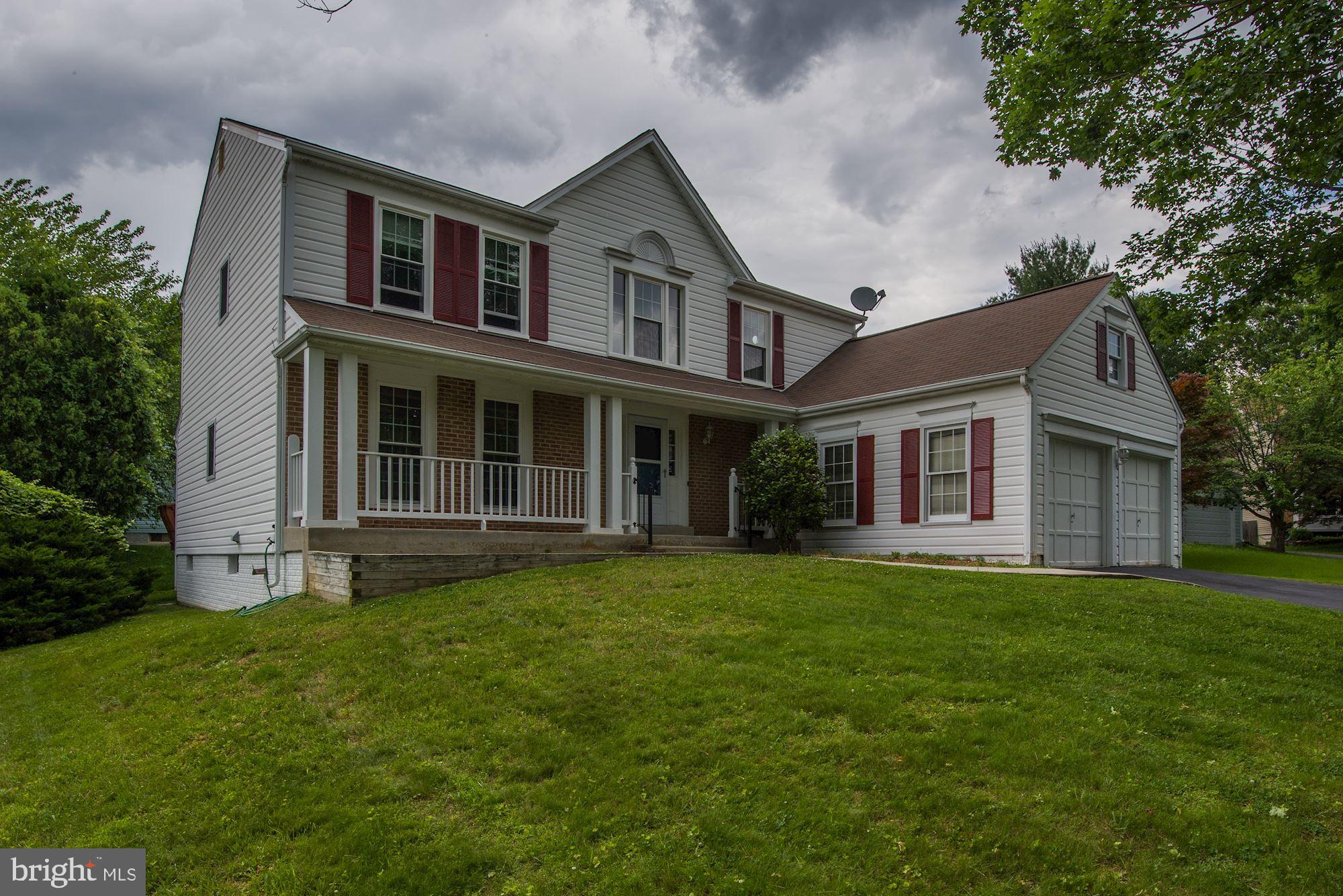 13509 Stockbridge Court Silver Spring, MD 20906 - Photo 3 of 35 a front view of a house with a garden