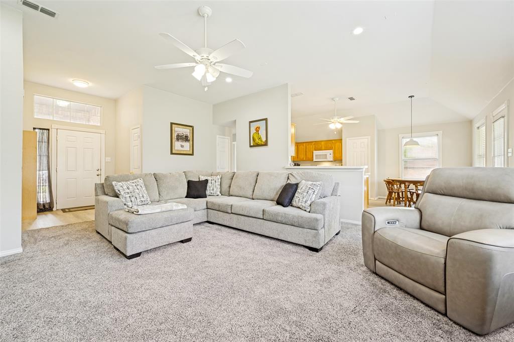 206 Ridge View Court Decatur, TX 76234 - Photo 11 of 29 a living room with furniture and a large window