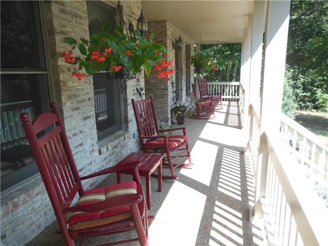 4168 Old Coopertown Road Springfield, TN 37172 - Photo 2 of 20 The front porch is so inviting with rocking chairs ready for new owners.
