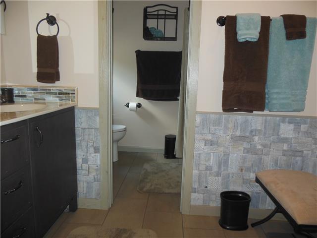 4168 Old Coopertown Road Springfield, TN 37172 - Photo 12 of 20 This bath is off the bedroom and it is just too cute. It has a Carribean theme that just makes you smile