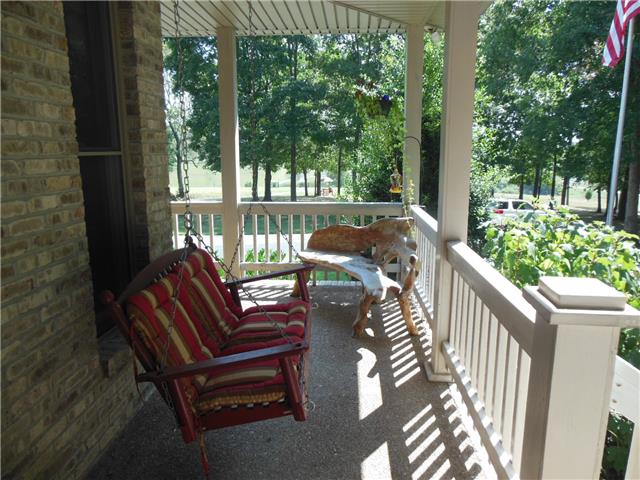 4168 Old Coopertown Road Springfield, TN 37172 - Photo 3 of 20 This side porch is the perfect place for morning coffee, it's right off the breakfast nook, that swing is always in the shade.