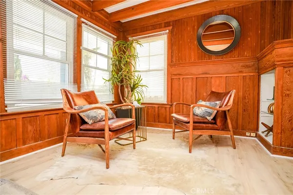 a living room with a couch and a window