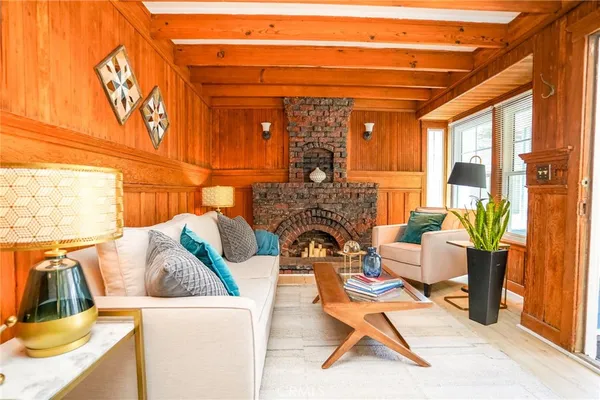 a view of a patio with couches and potted plants