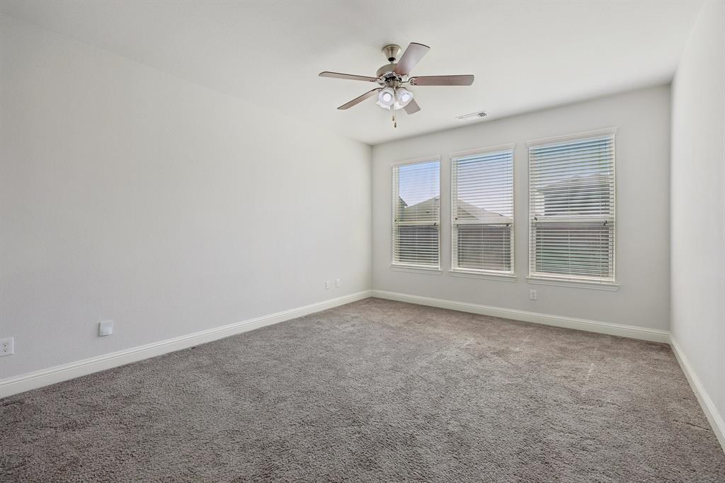 1205 Templin Avenue Forney, TX 75126 - Photo 15 of 40 a view of an empty room with a window