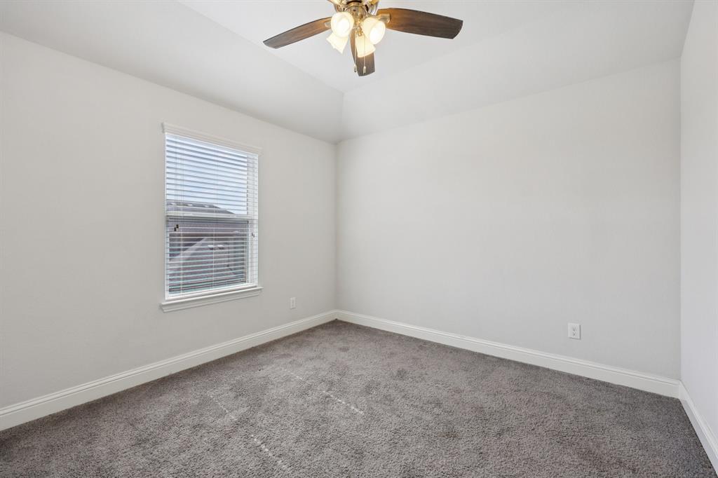 1205 Templin Avenue Forney, TX 75126 - Photo 29 of 40 an empty room with a window