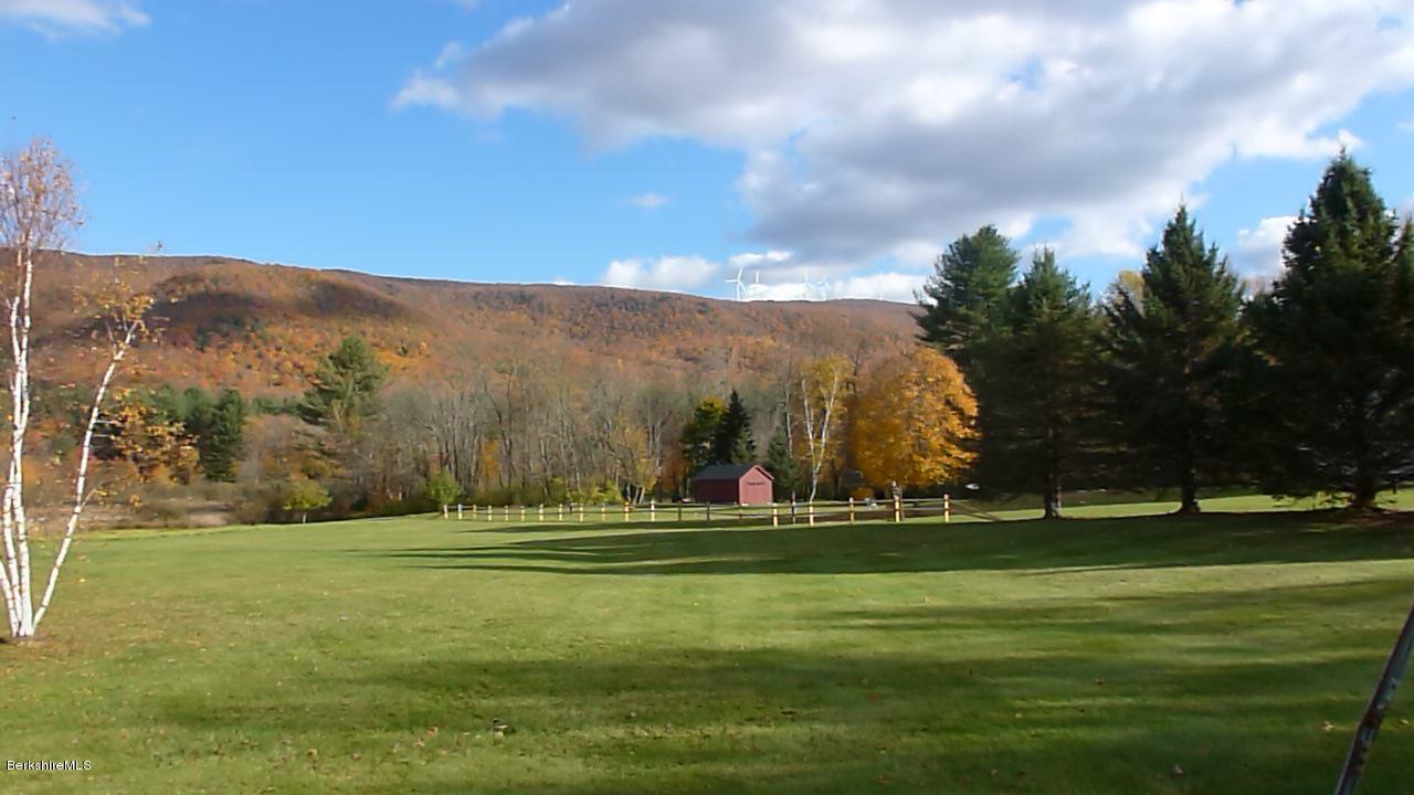 1254 Main Road Stamford, VT 05352 - Photo 12 of 39 a view of a golf course with a yard