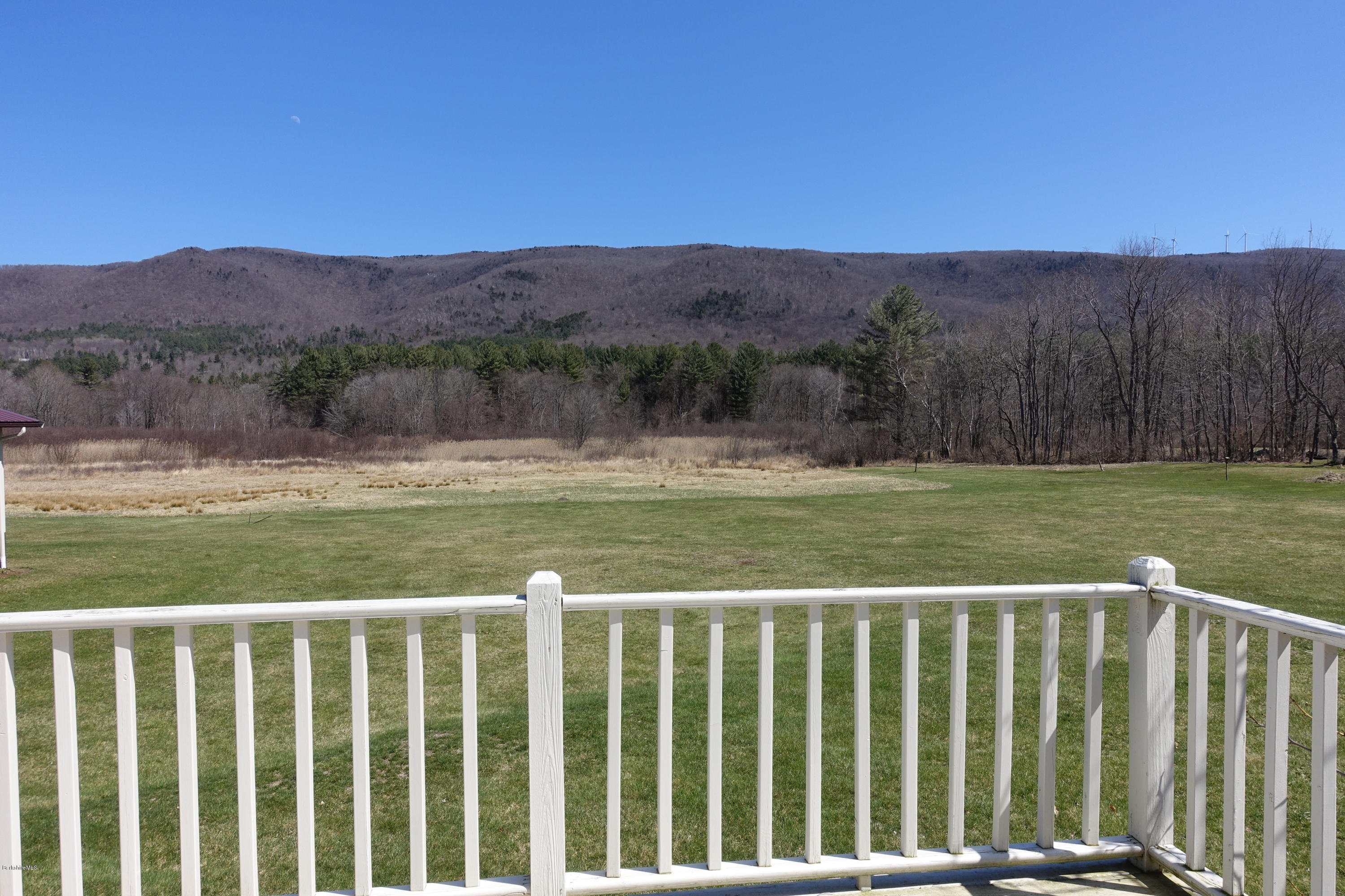 1254 Main Road Stamford, VT 05352 - Photo 15 of 39 a view of a green field with a yard