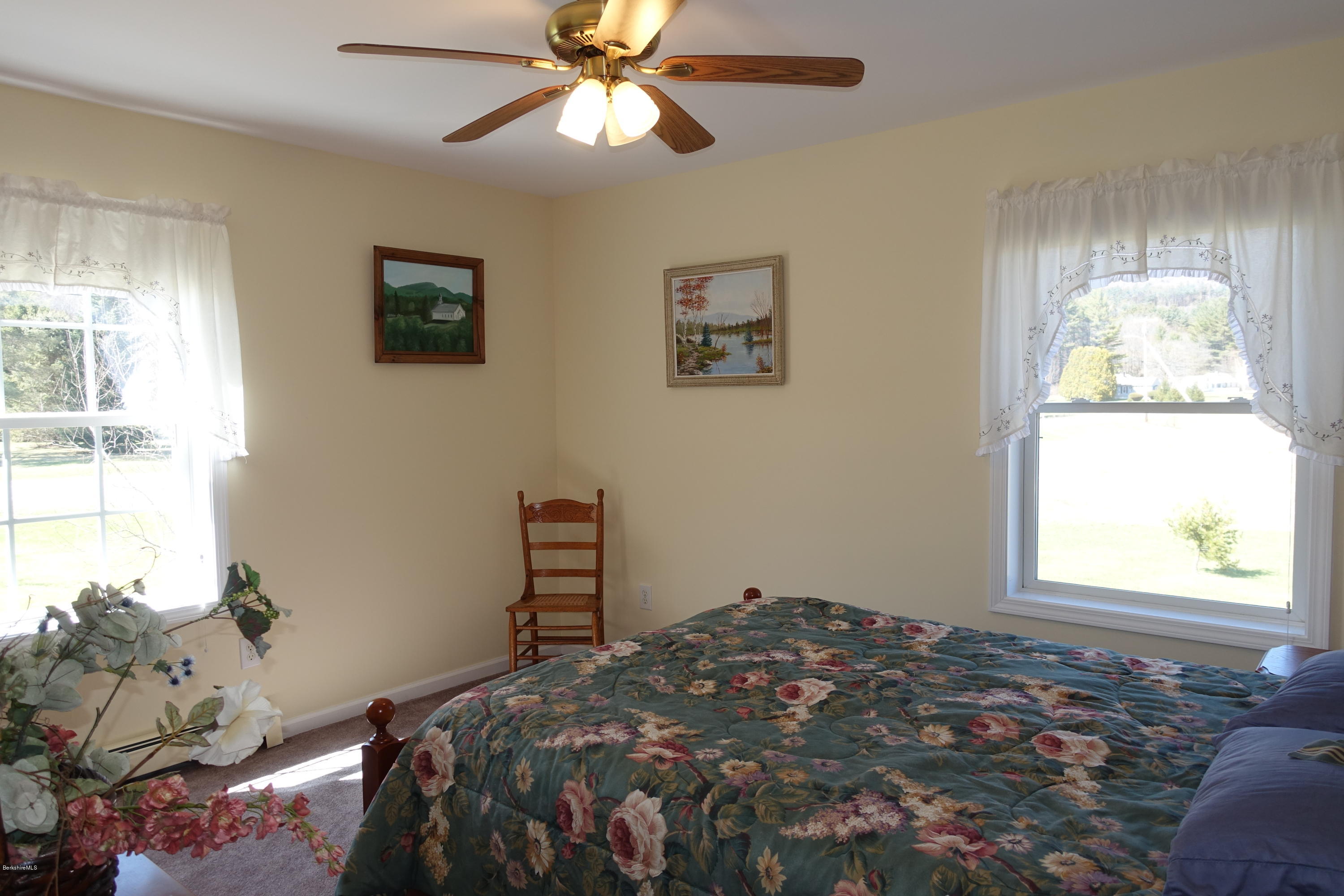 1254 Main Road Stamford, VT 05352 - Photo 25 of 39 a bedroom with a bed and a window