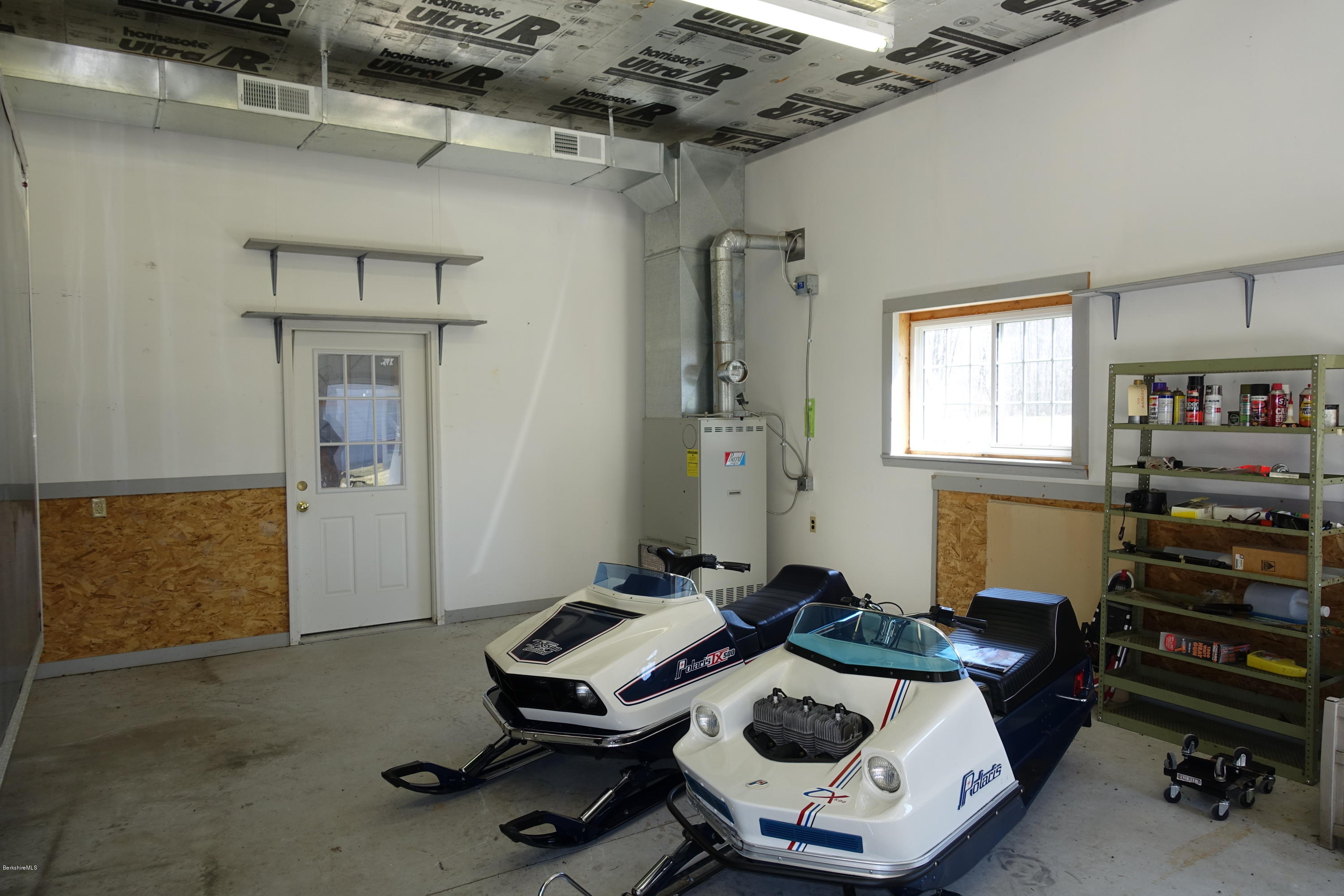 1254 Main Road Stamford, VT 05352 - Photo 33 of 39 a room with furniture and gym equipment