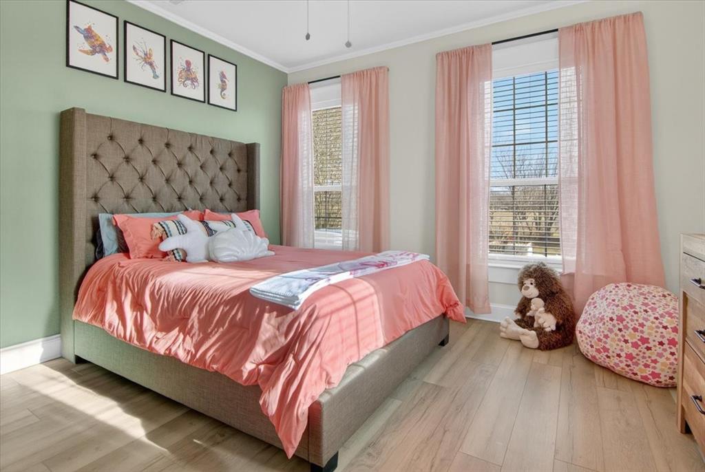 278 Leuschner Road Elm Mott, TX 76640 - Photo 26 of 31 a bedroom with a bed and window