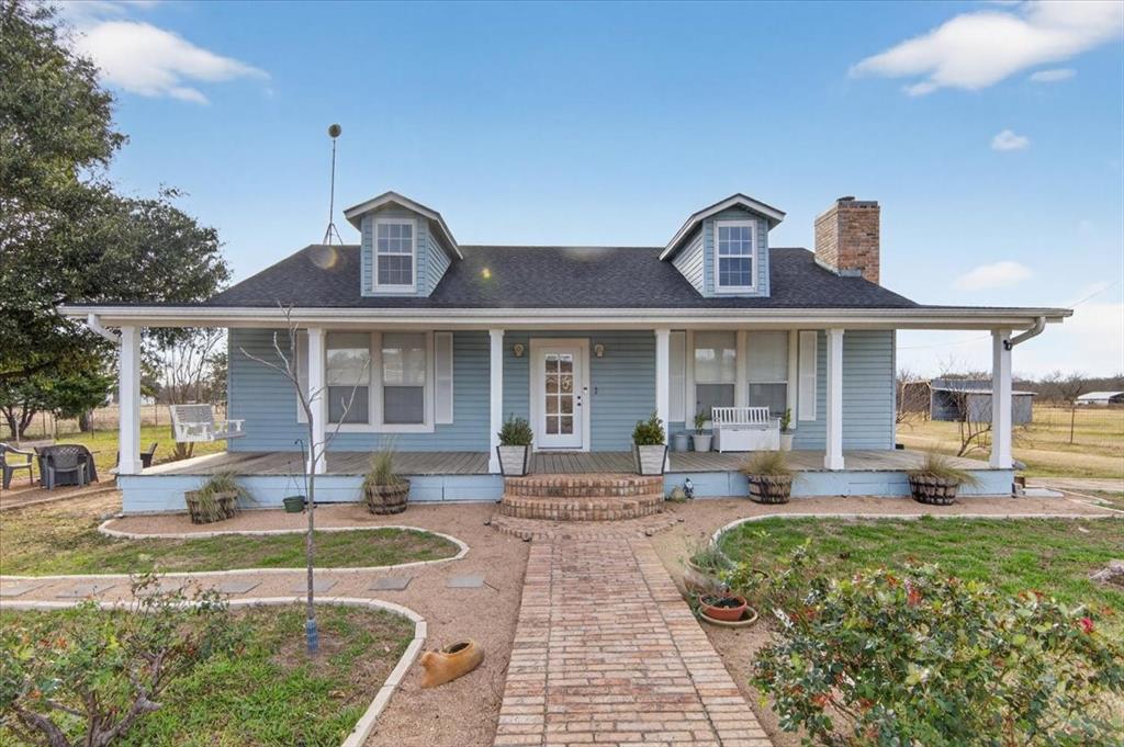 278 Leuschner Road Elm Mott, TX 76640 - Photo 3 of 31 a front view of a house with swimming pool and furniture
