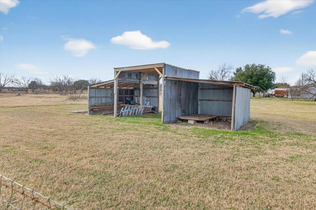 278 Leuschner Road Elm Mott, TX 76640 - Photo 5 of 31 a view of a house with backyard and pool