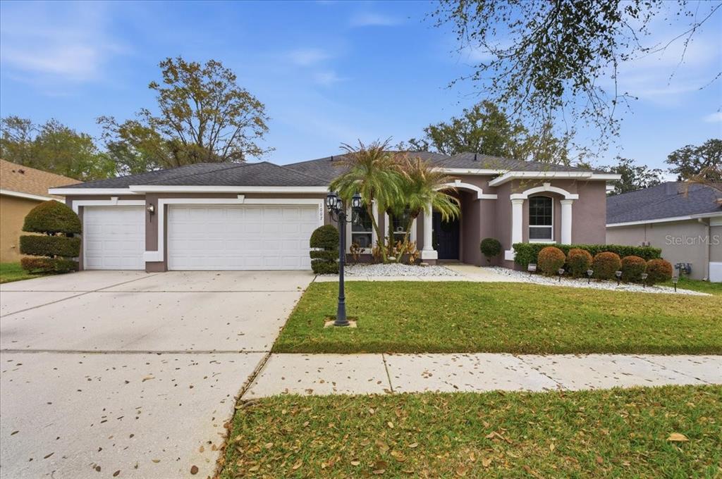 1007 Split Silk Street Valrico, FL 33594 - Photo 1 of 1 front view of a house with a yard