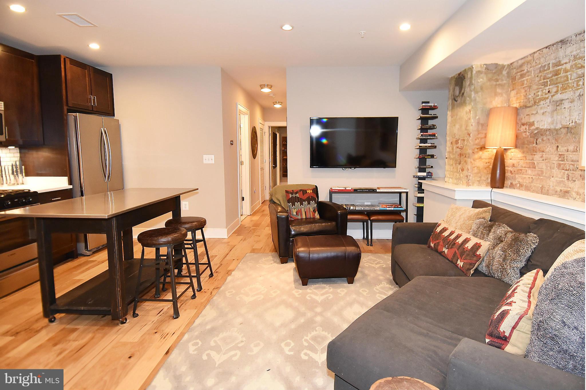 1442 Harvard Street Northwest, Unit 1 Washington, DC 20009 - Photo 1 of 28 Exposed brick charm