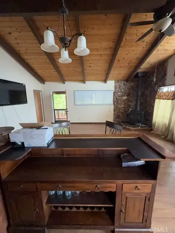 a kitchen with a stove and a microwave
