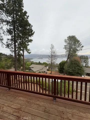 a view of wooden balcony with outdoor space