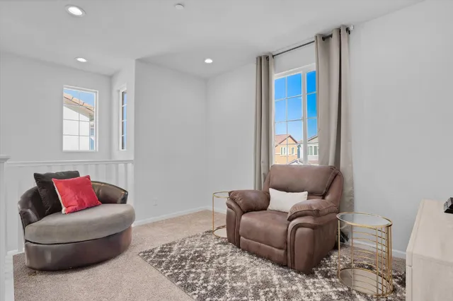 a living room with furniture and a couch