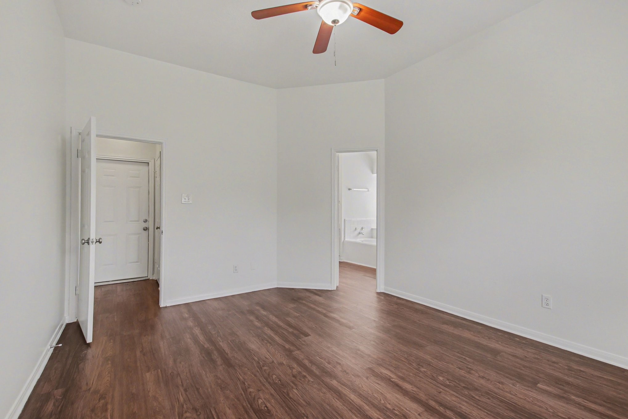 7203 Glen Rosa Drive Katy, TX 77494 - Photo 14 of 28 a view of an empty room with wooden floor