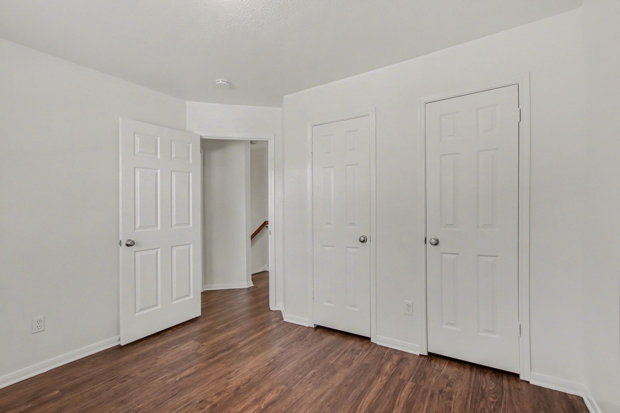 7203 Glen Rosa Drive Katy, TX 77494 - Photo 19 of 28 a view of an empty room with wooden floor