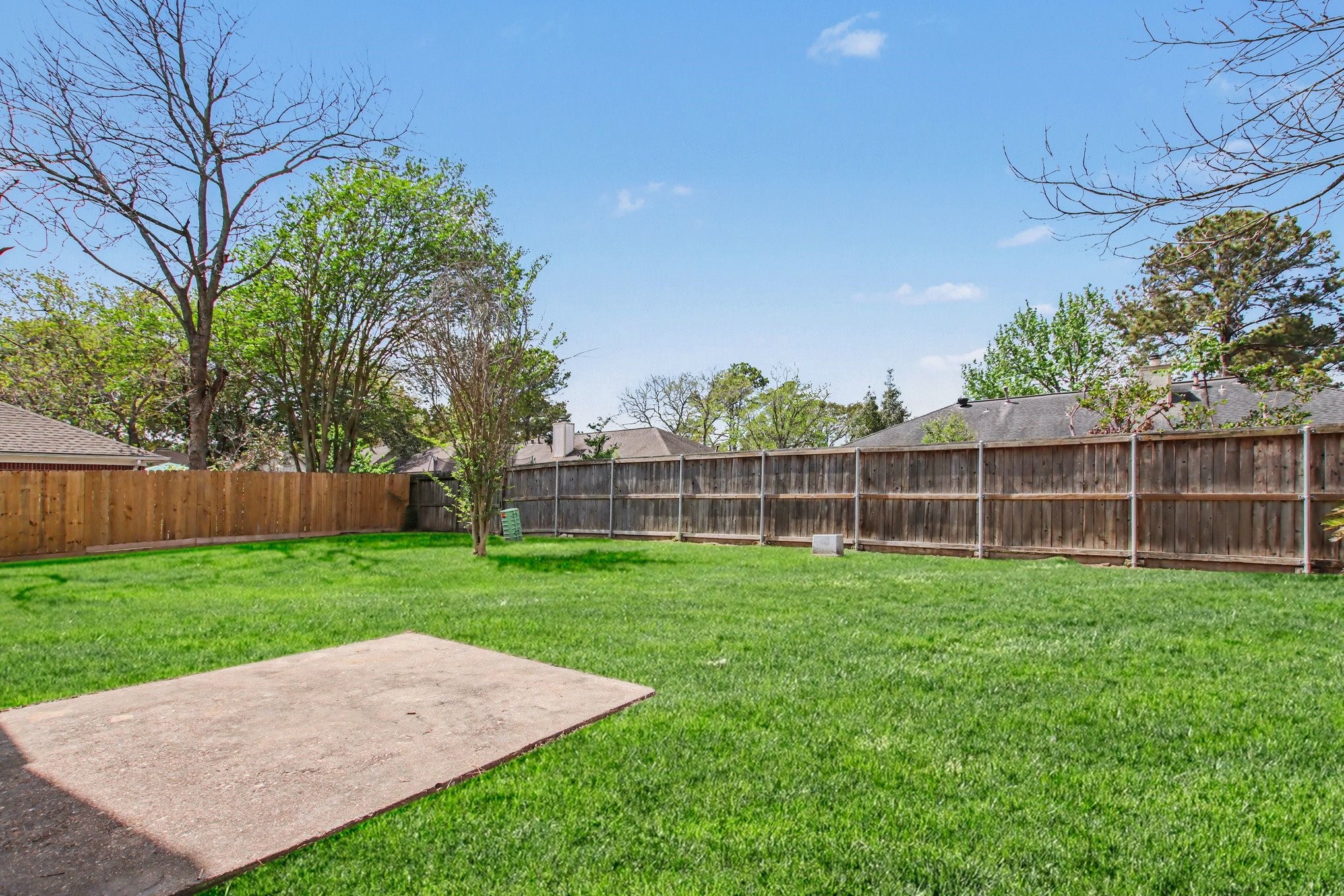 7203 Glen Rosa Drive Katy, TX 77494 - Photo 25 of 28 a view of a yard with a small yard and wooden fence