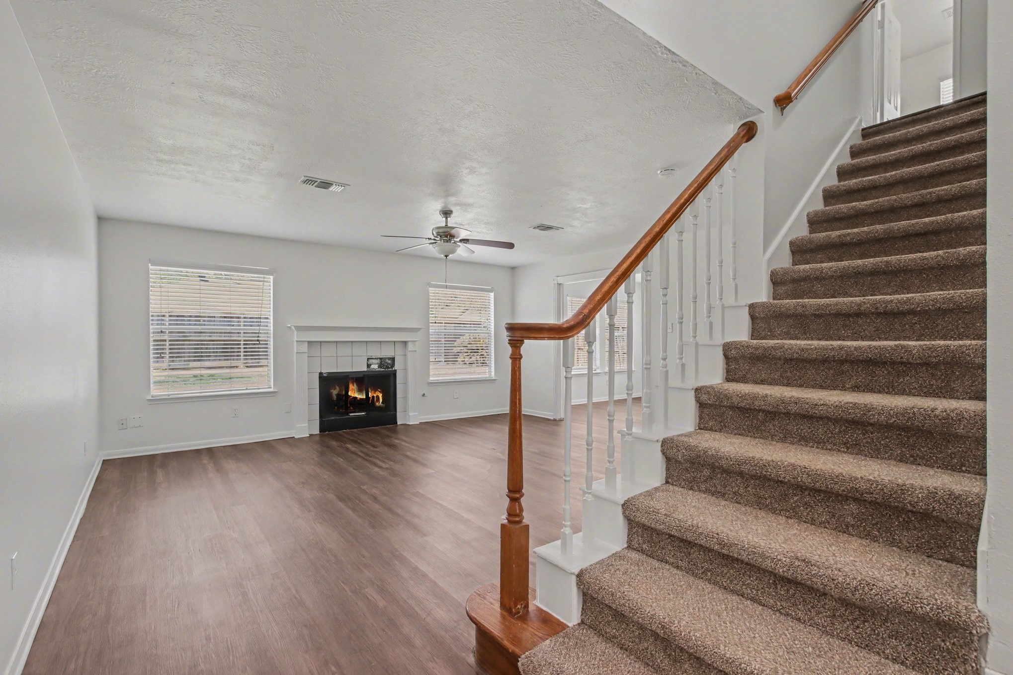 7203 Glen Rosa Drive Katy, TX 77494 - Photo 26 of 28 a view of entryway and hall with wooden floor