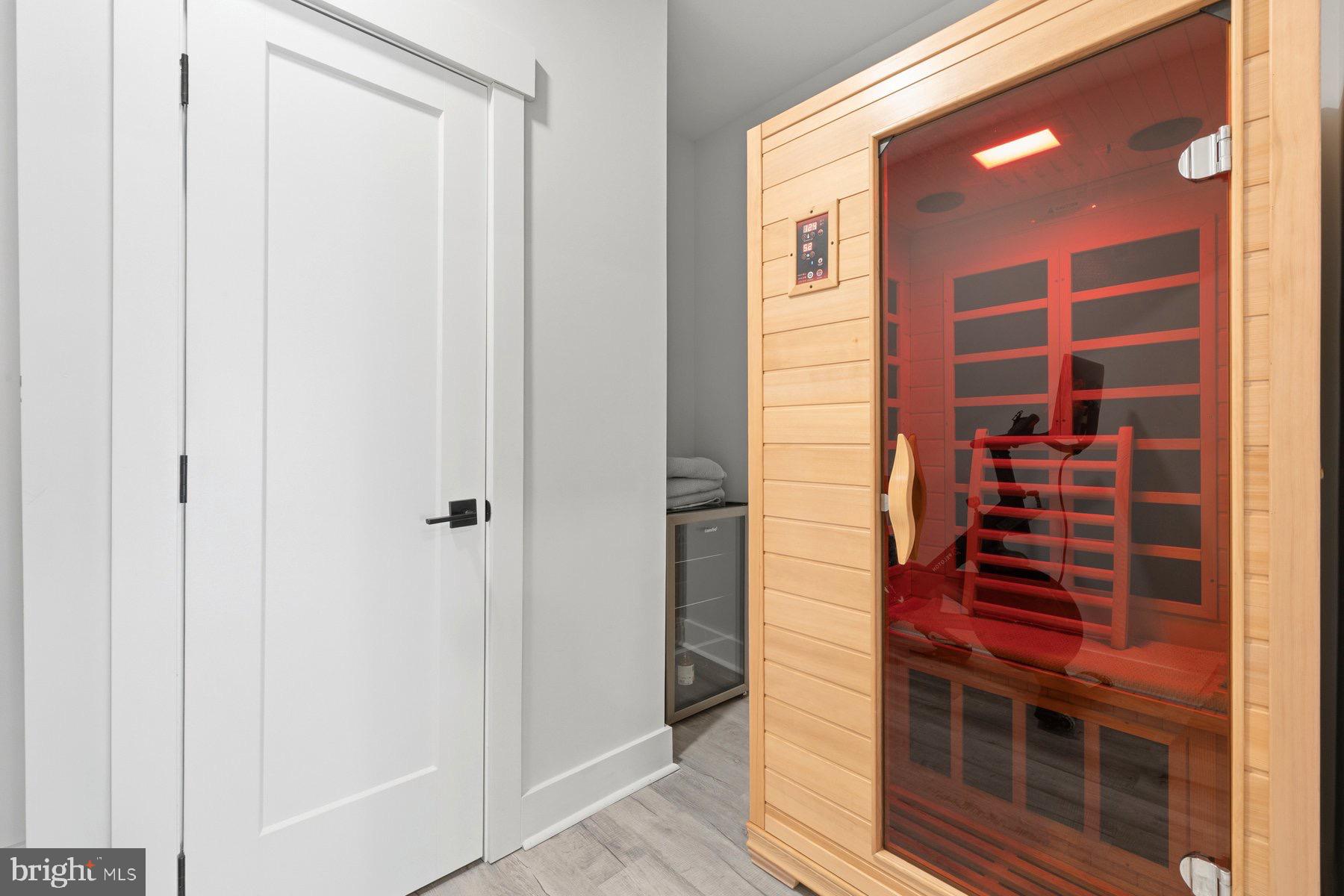 6724 Hemlock Point Road New Market, MD 21774 - Photo 32 of 51 Basement sauna retreat for relaxation & wellness.