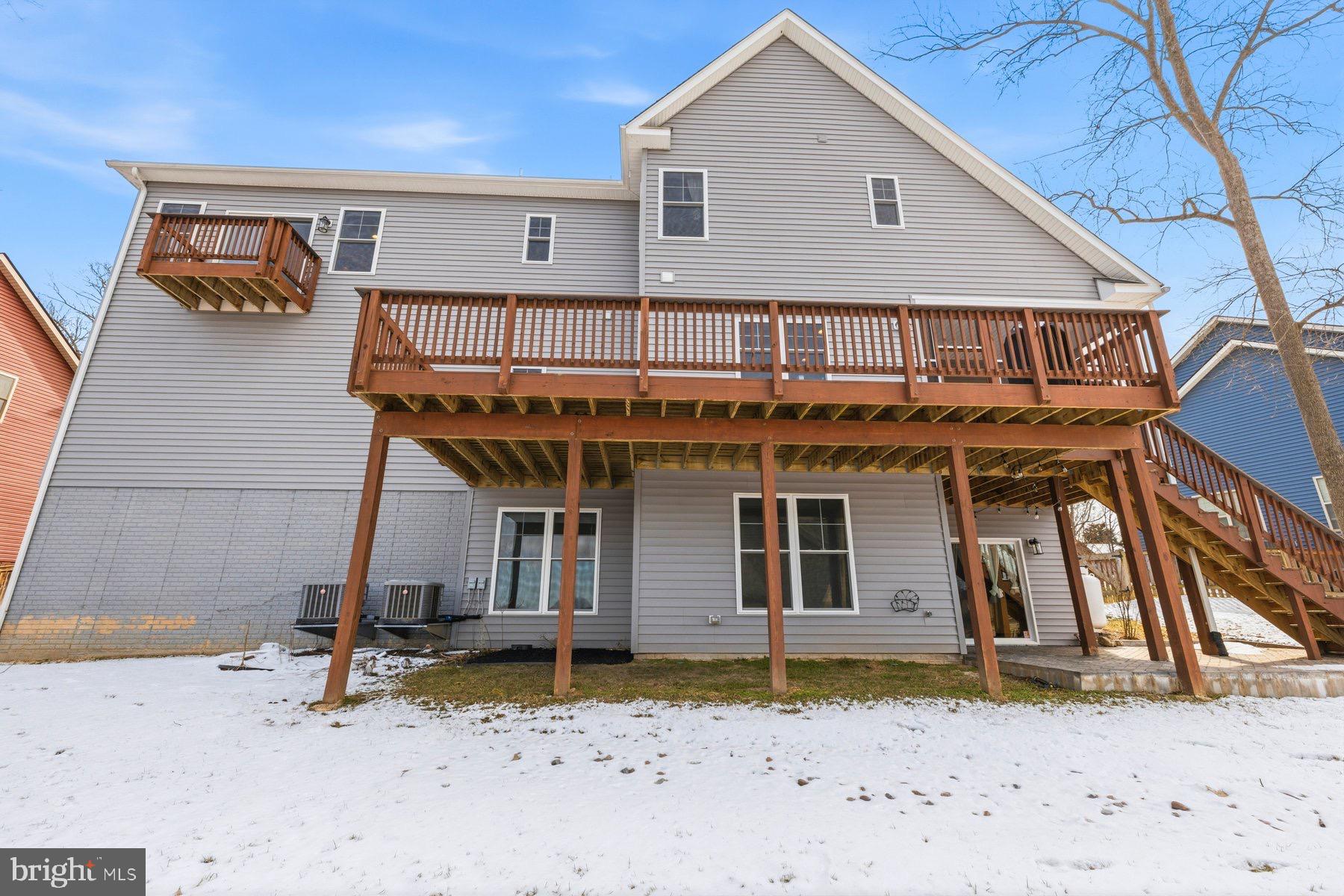 6724 Hemlock Point Road New Market, MD 21774 - Photo 38 of 51 Steps from deck to yard. Walkout basement to patio