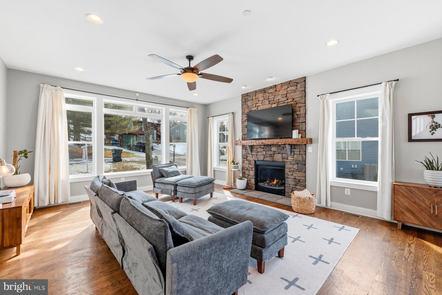 6724 Hemlock Point Road New Market, MD 21774 - Photo 4 of 51 Bright, inviting family room w/ stone fireplace.