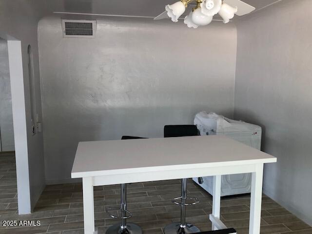 333 West Almeria Road Phoenix, AZ 85003 - Photo 3 of 14 a view of a room that has a table and chairs in it