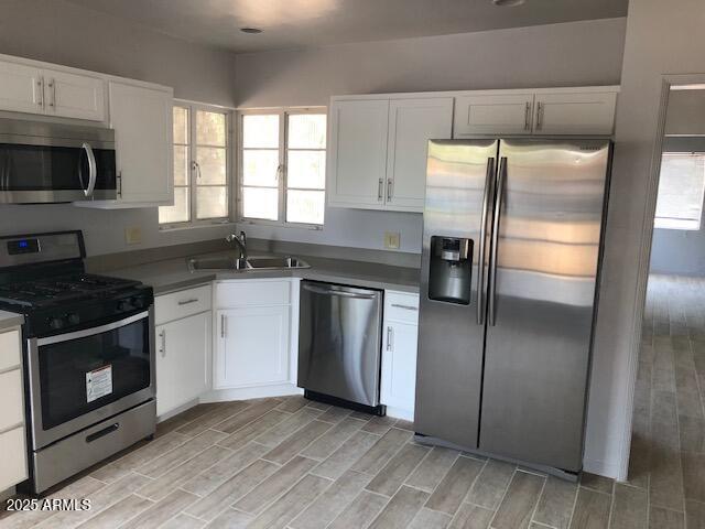 333 West Almeria Road Phoenix, AZ 85003 - Photo 4 of 14 a kitchen with a sink stove and refrigerator