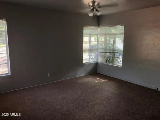 an empty room that has a window