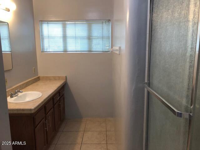 333 West Almeria Road Phoenix, AZ 85003 - Photo 10 of 14 a bathroom with a toilet sink and mirror
