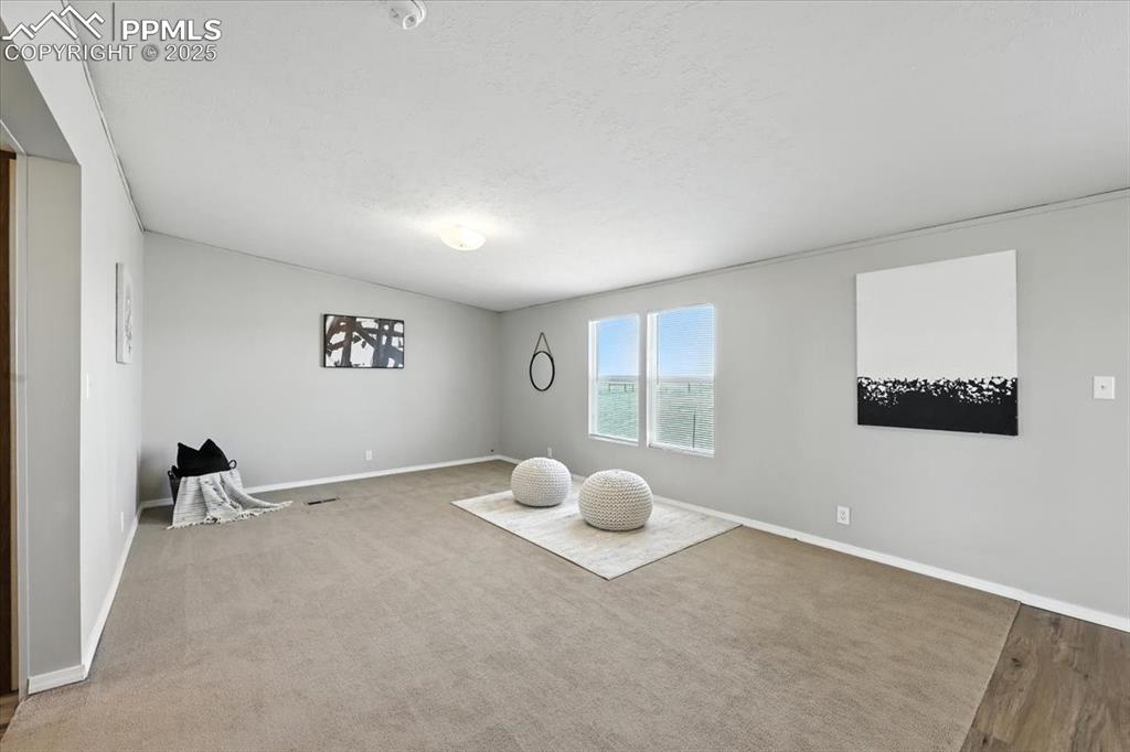 13560 Whittemore Road Yoder, CO 80864 - Photo 14 of 50 a view of an empty room and window