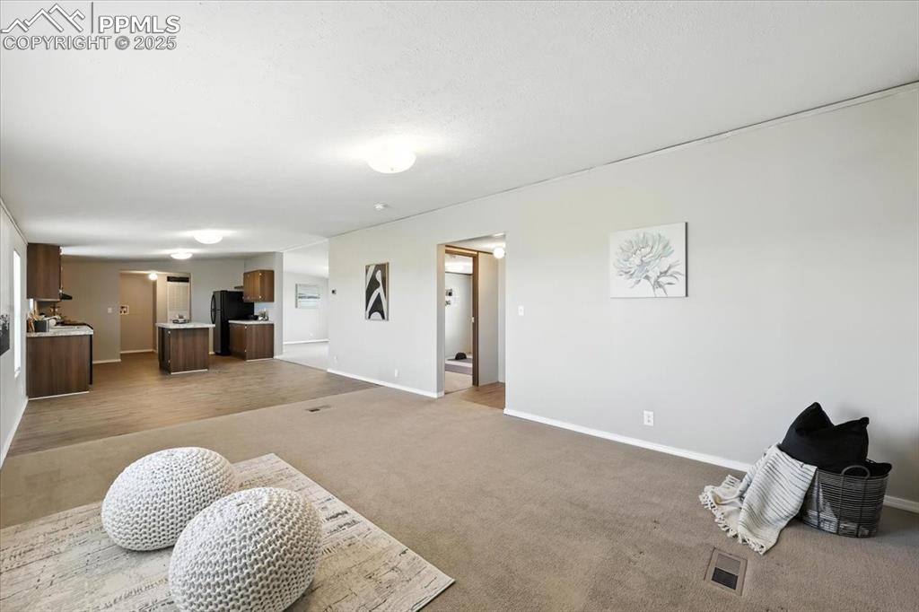 13560 Whittemore Road Yoder, CO 80864 - Photo 15 of 50 a living room with furniture