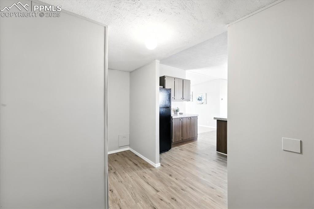 13560 Whittemore Road Yoder, CO 80864 - Photo 23 of 50 a bedroom with a bed and a view of kitchen
