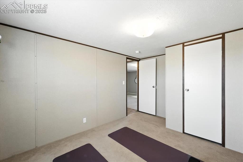 13560 Whittemore Road Yoder, CO 80864 - Photo 25 of 50 a view of an empty room