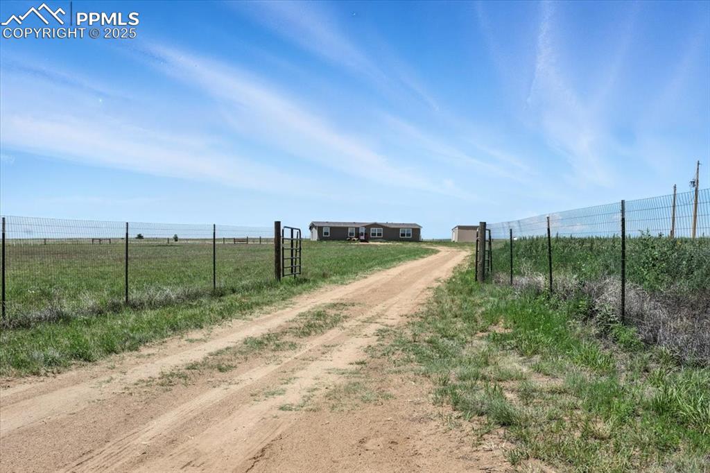 13560 Whittemore Road Yoder, CO 80864 - Photo 38 of 50 a view of a pathway with a park