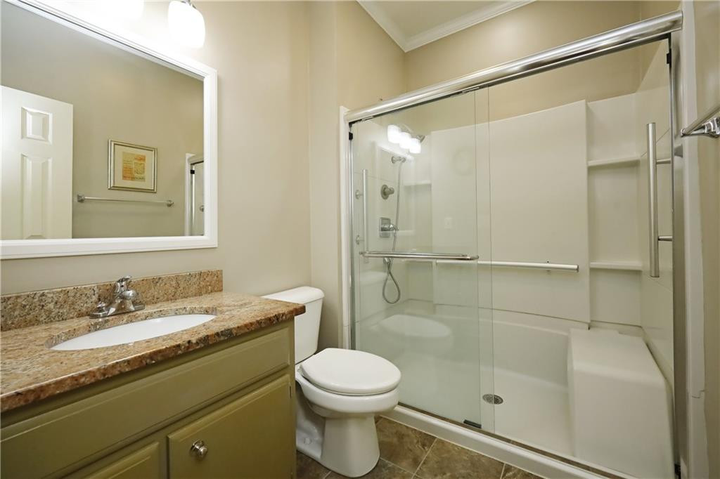 1670 Deep Creek Church Road Burlington, NC 27217 - Photo 24 of 36 a bathroom with a sink and a mirror