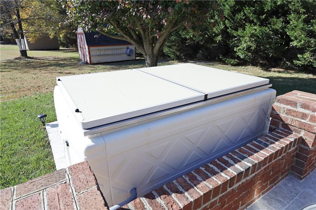 1670 Deep Creek Church Road Burlington, NC 27217 - Photo 27 of 36 a view of a backyard with sitting area