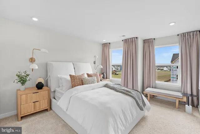 a living room with furniture and window