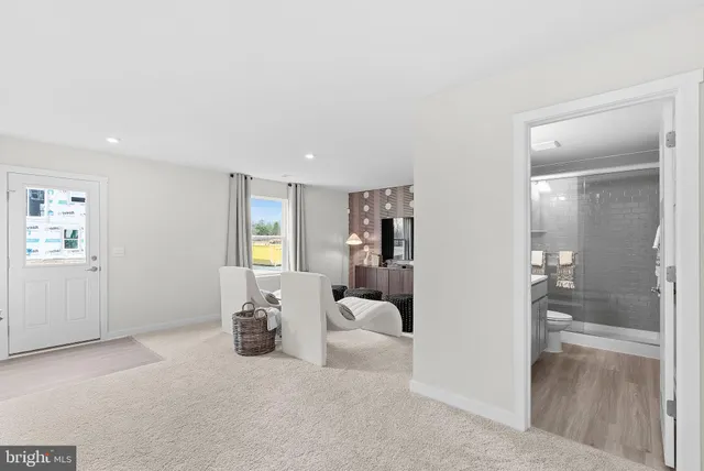 a living room with furniture and window