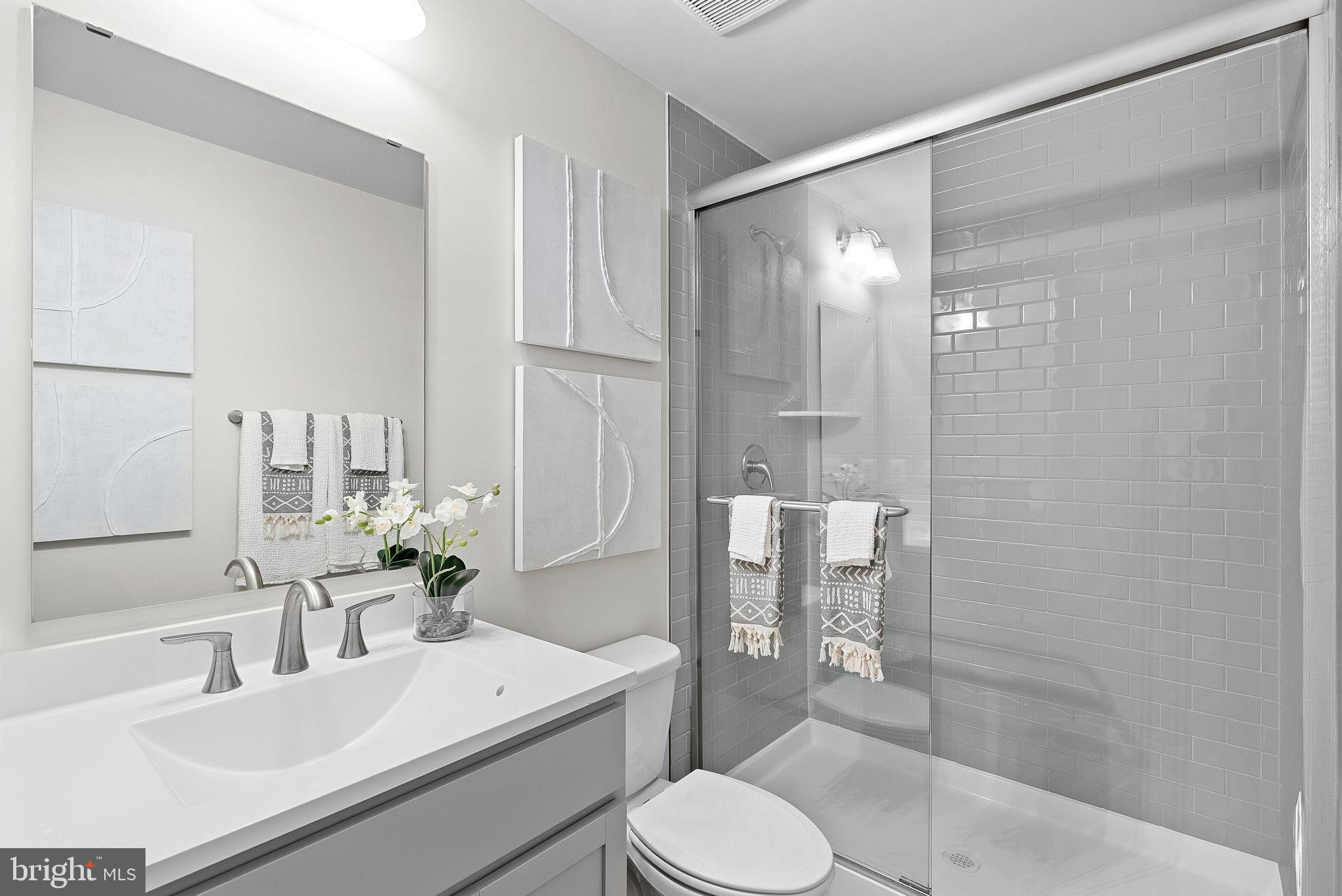 23 Elmiraj Court Inwood, WV 25428 - Photo 24 of 26 a bathroom with a sink toilet and shower