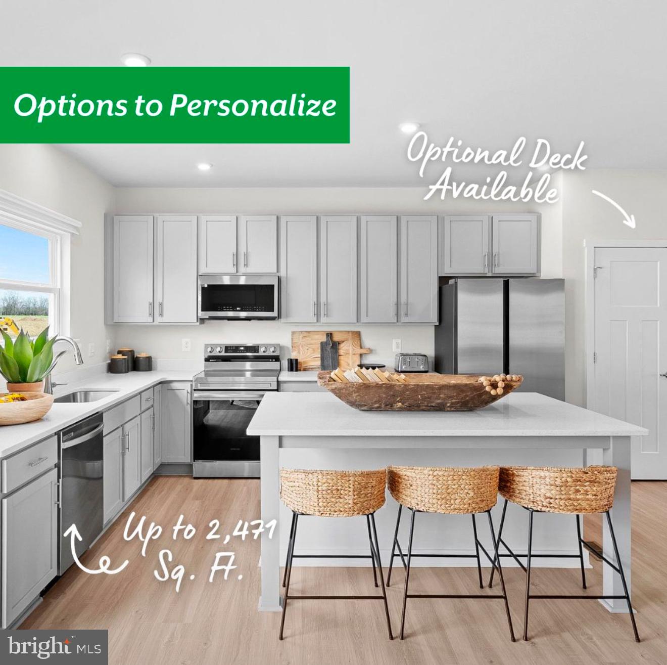 23 Elmiraj Court Inwood, WV 25428 - Photo 4 of 26 a kitchen with a table chairs sink and cabinets