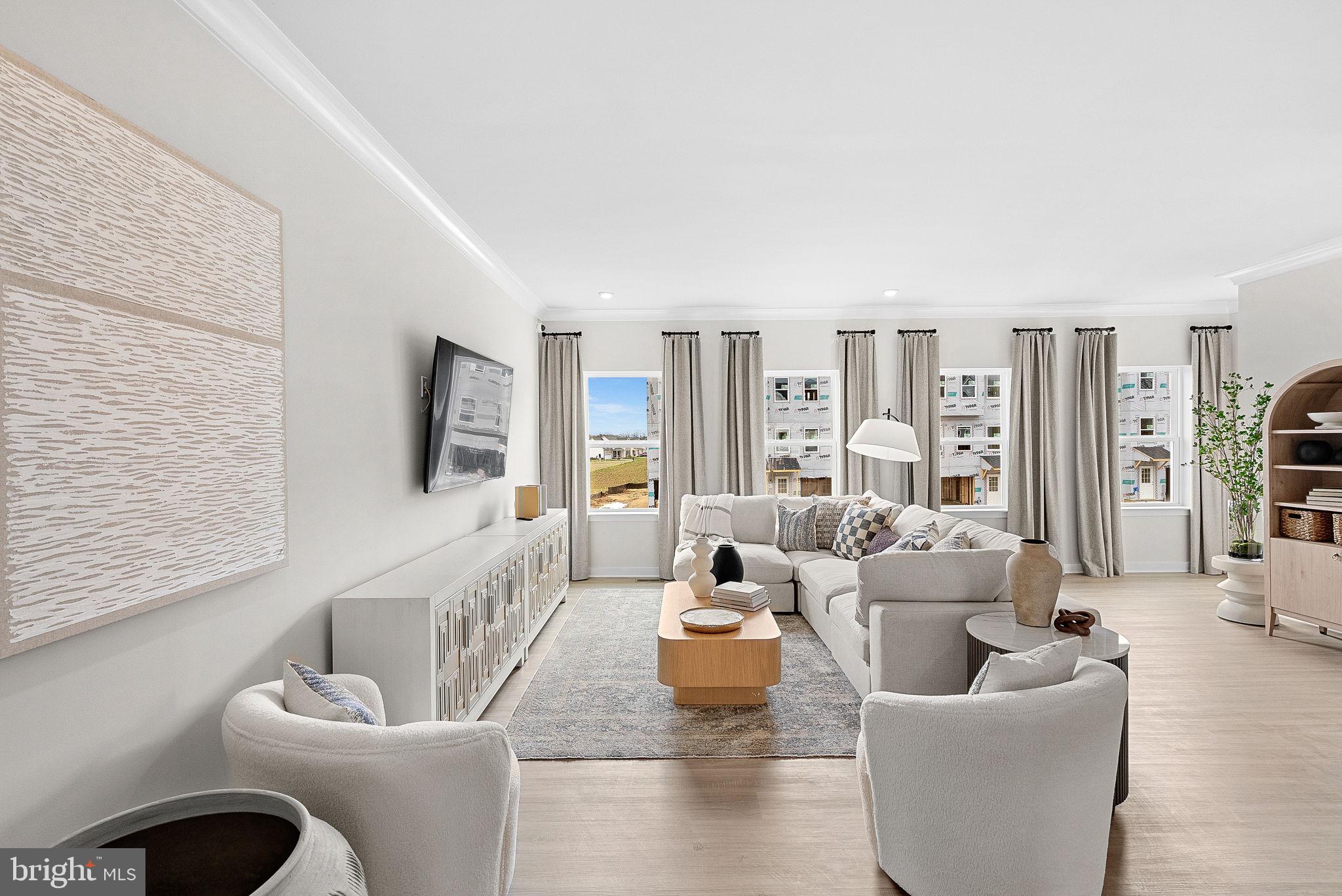 23 Elmiraj Court Inwood, WV 25428 - Photo 10 of 26 a living room with furniture and a large window