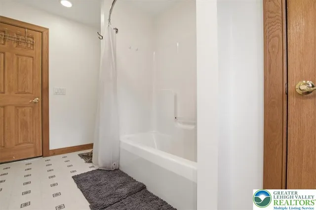 a front view of house with yard outdoor seating and barbeque oven