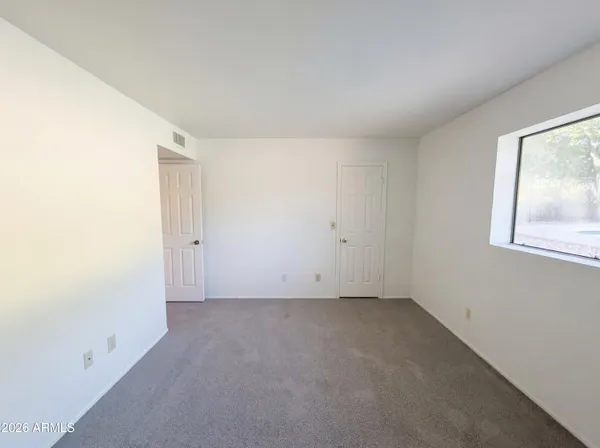 an empty room with a window
