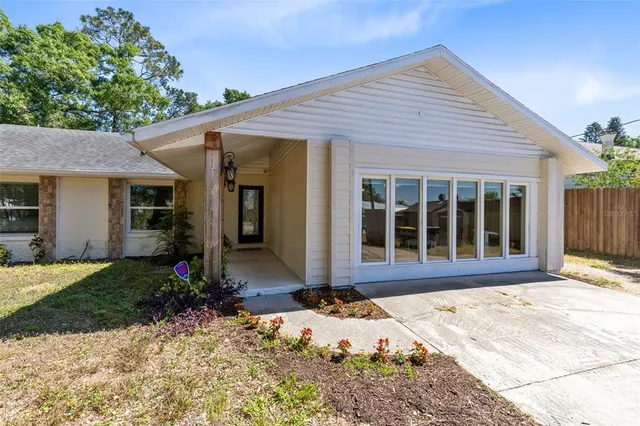 a front view of a house with a porch