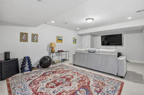 a bedroom with a bed and a cabinets